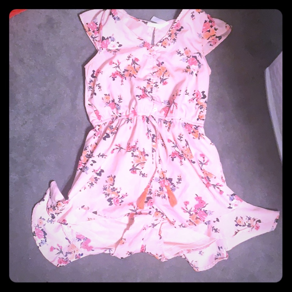This is a gorgeous floral pink romper 💞